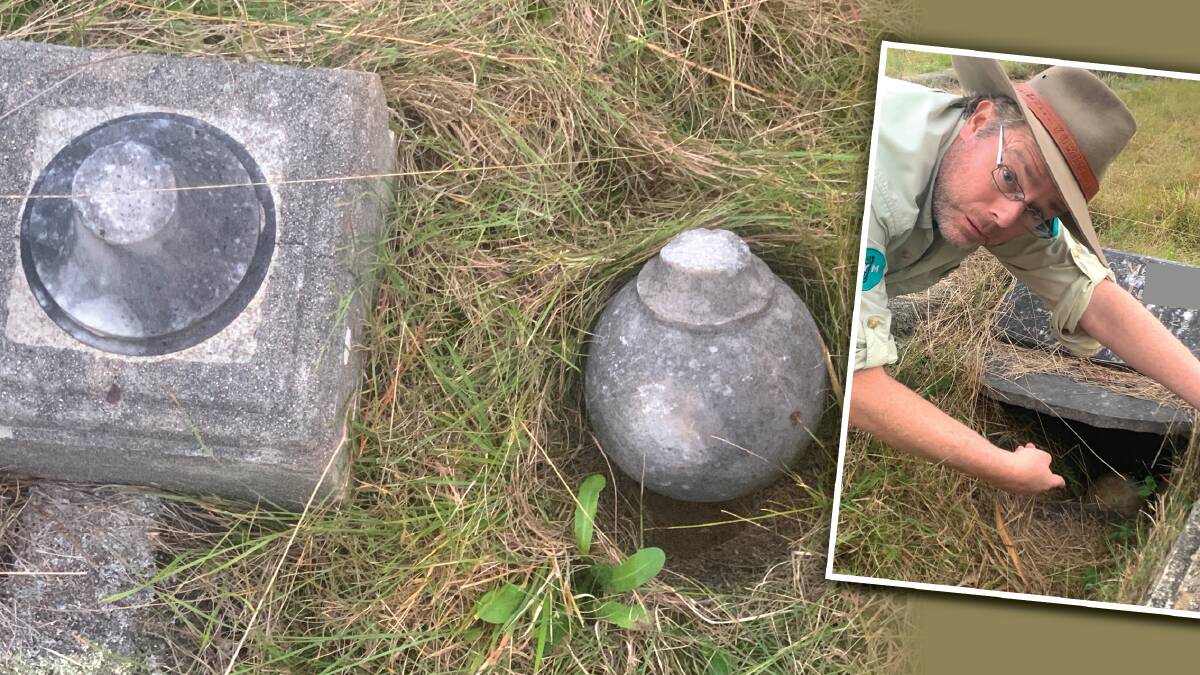 Tim was shocked at the site of this grave in a cemetery near Canberra but was relieved to find out the grey spherical object in the burrow was a grave ornament. Picture by Graeme Rossiter
