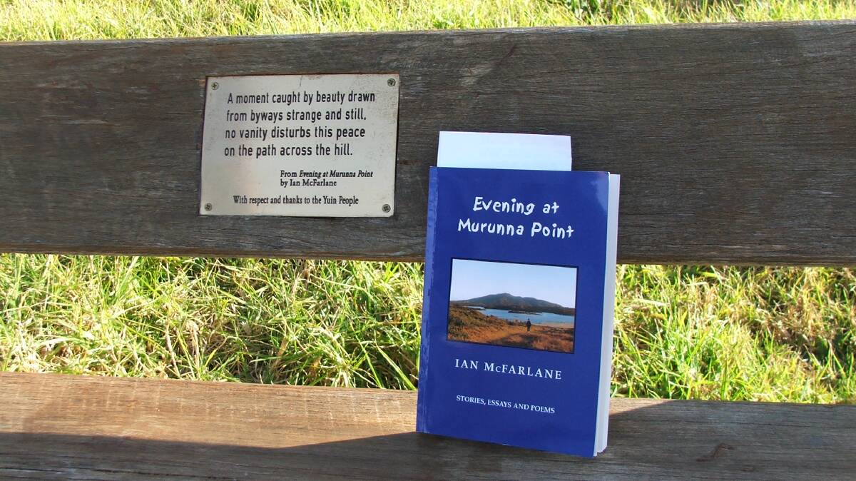 A stanza from Ian McFarlane's poem Last Light at Murunna Point on the park bench overlooking Murunna Point. Picture by Tim the Yowie Man