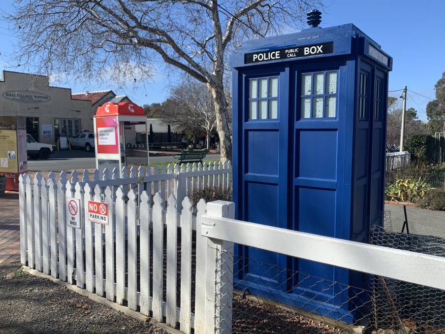 Shaun O'Connor's TARDIS sits adjacent to a Telstra payphone in Victoria Street, Hall. Picture: Tim the Yowie Man
