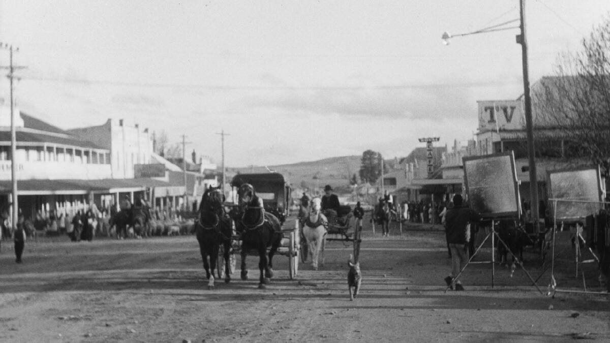 The main street of Braidwood in 1969, covered with red dirt that was trucked in for the filming of Ned Kelly. Picture by Neal Gowen