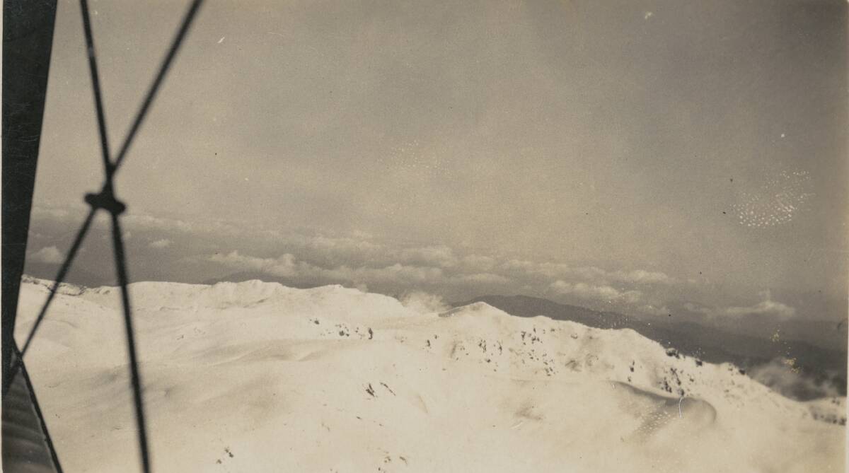 Aerial view over Mount Kosciuszko taken from a Gipsy Moth while searching for the lost skiers in 1928. Picture: Supplied