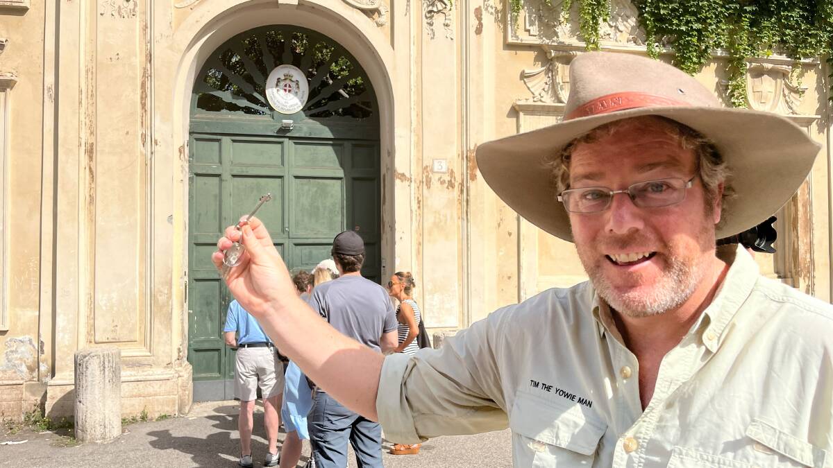 Tim joins the queue waiting to peek through Rome's Aventine keyhole. Oh, and that's his hotel key, not the key to the infamous door. Picture by Tim the Yowie Man