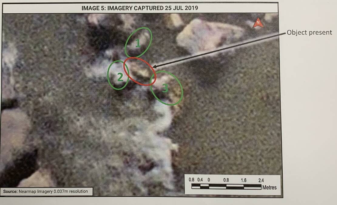 A photograph taken from commercial aircraft aerially mapping much of the ACT captured this 2019 image from the Murrumbidgee River, which was the first indication that a previously undetected object was found. An arrow points out the suspected location of the human body. Picture supplied 