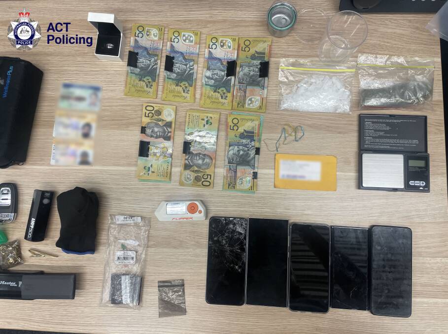The drugs, cloning device, phones, cash and stolen identity cards seized by police at the traffic stop in Higgins this week. Picture supplied