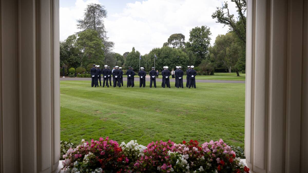 The new police graduates on parade on the lush lawns of Government House. Picture supplied 