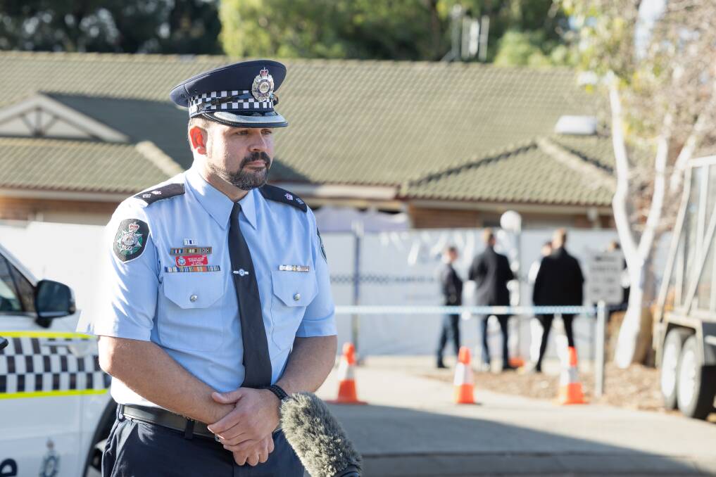 Detective acting Superintendent Stephen Ladd addresses media outside the Gordon home on Sunday. Picture by Sittihixay Ditthavong