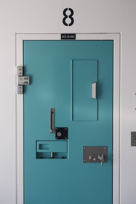 A jail cell door at the Alexander Maconochie Centre. Picture by Jay Cronan
