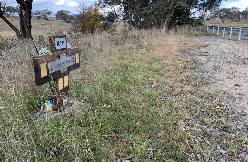 One of the many roadside memorials on the Monaro Highway south of Canberra. Picture by Peter Brewer