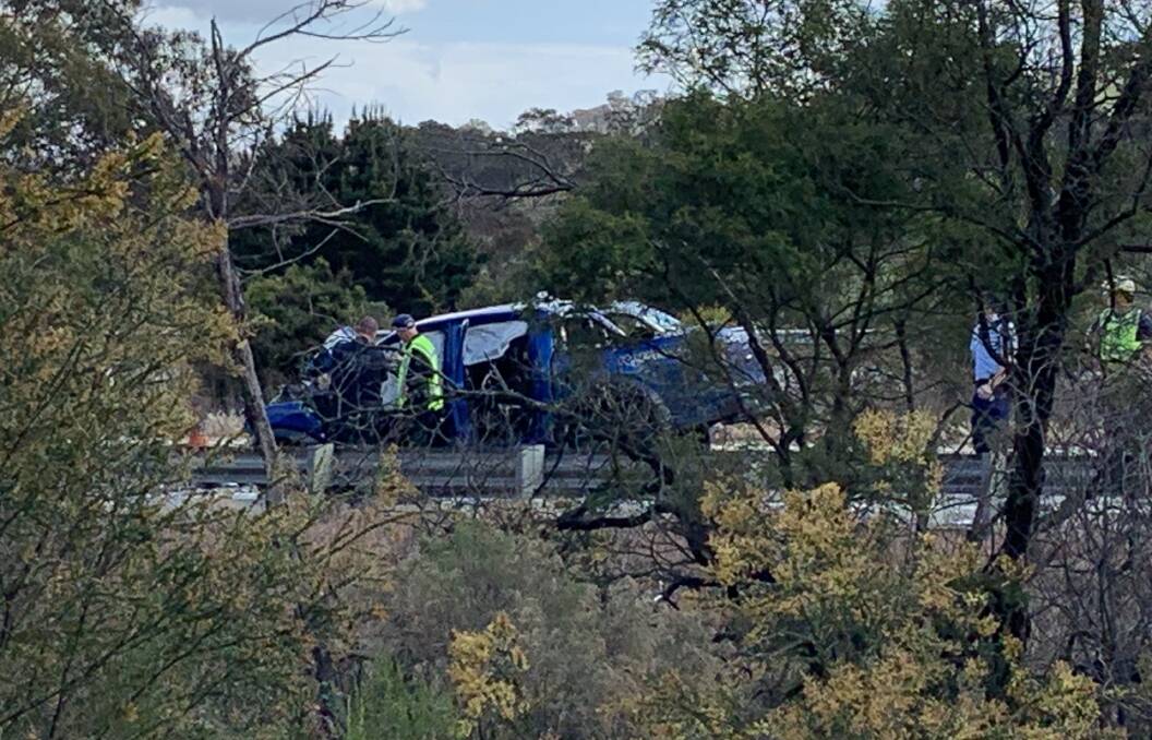 A high speed impact into the back of a B-double fuel tanker deployed all airbags and flattened the front of the dual cab ute on the Federal Highway. Picture by Peter Brewer 