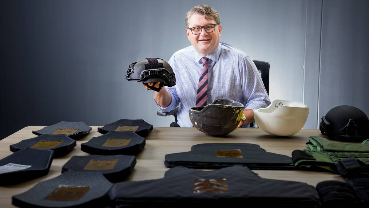X-Tek chief executive Scott Basham with some of the many ballistics products the ACT-based company produces. Picture by Sitthixay Ditthavong