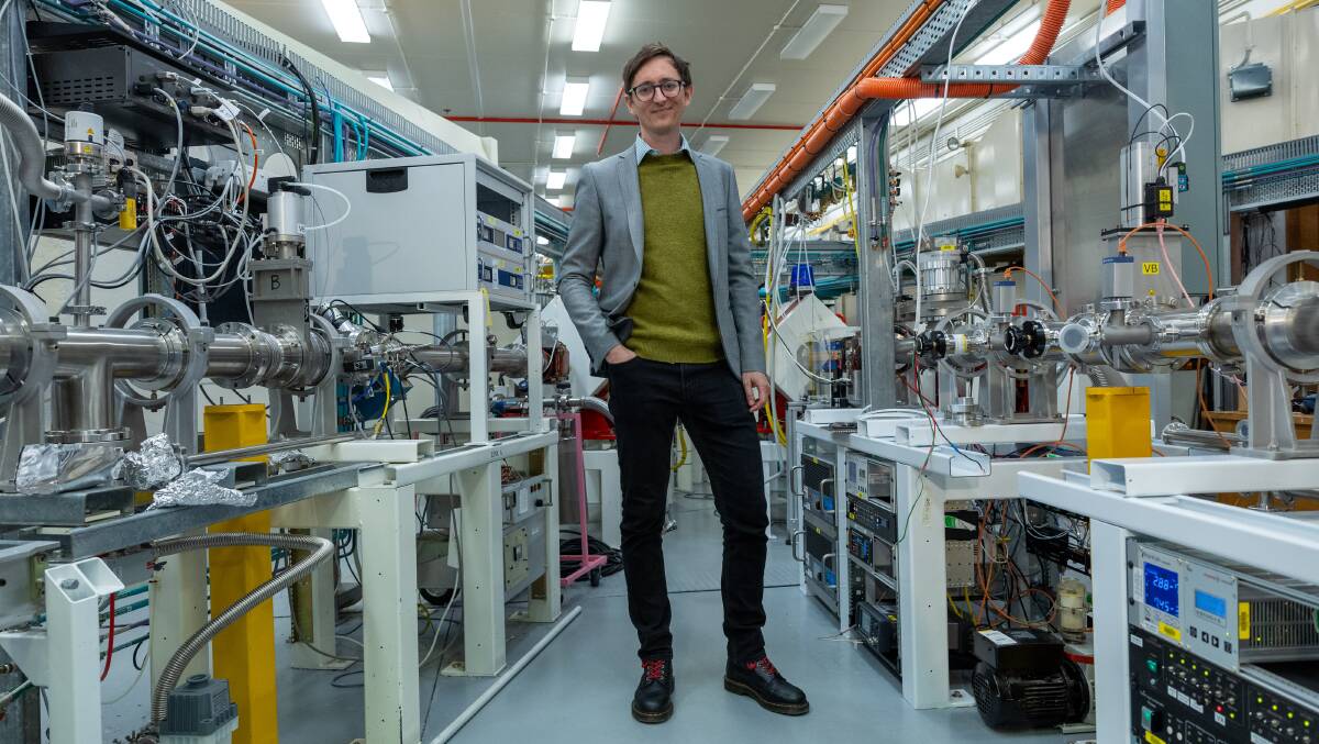 ANU research fellow Dr Ed Simpson in between two of the laboratory's beamlines. Picture by Gary Ramage 