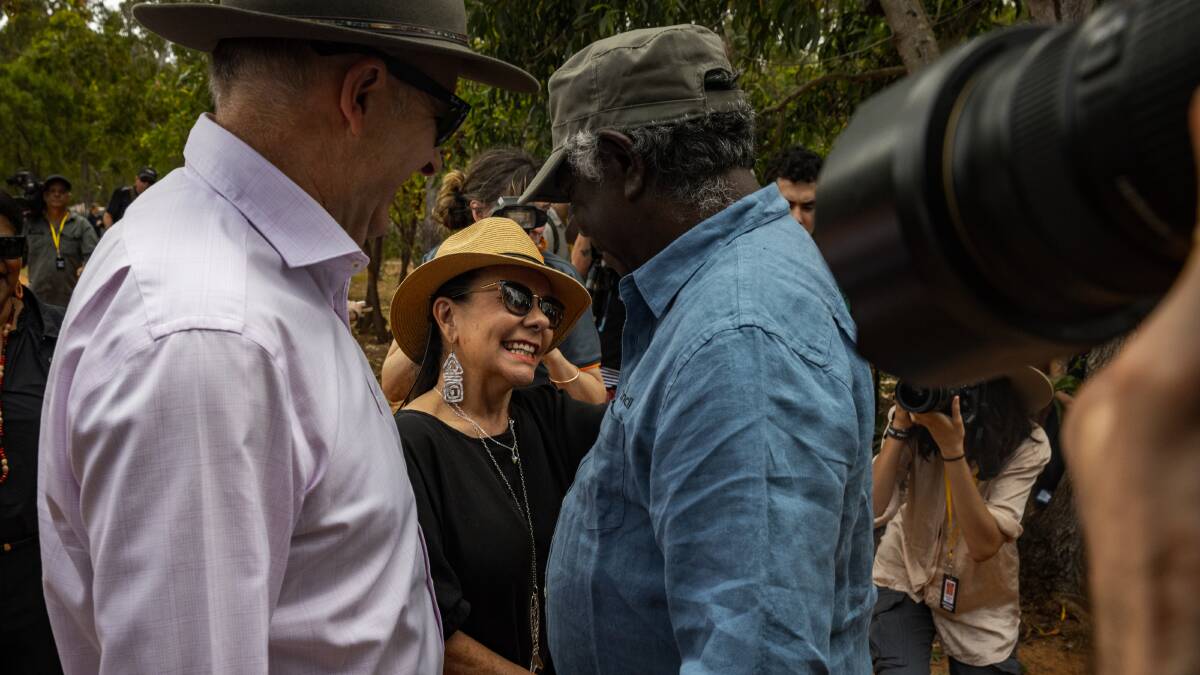 Prime Minister Anthony Albanese and Minister for Indigenous Australians Linda Burney meet with Yolngu Elder Mr. Djawa Yunupingu. Picture Getty Images 