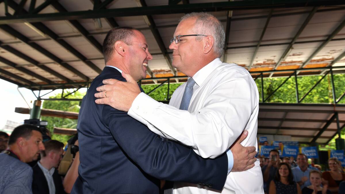 Treasurer Josh Frydenberg and Prime Minister Scott Morrison at an LNP campaign rally in Brisbane on Sunday. Photo: AAP Image/Mick Tsikas