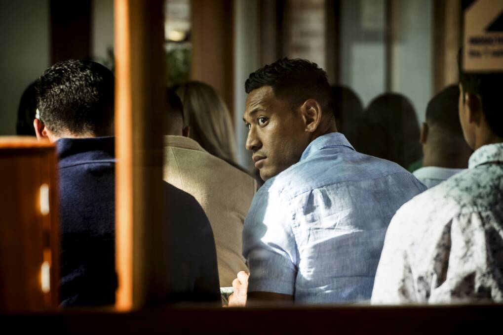 Israel Folau, attending church on Sunday, is yet to contact Rugby Australia about his next course of action. Photo: Steven Siewert