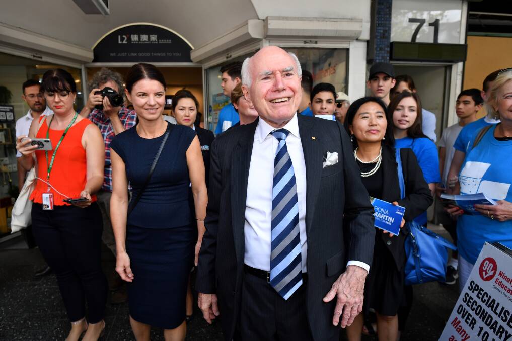 Liberal Reid candidate Fiona Martin on the campaign trail in Burwood with former PM, John Howard. Picture: AAP