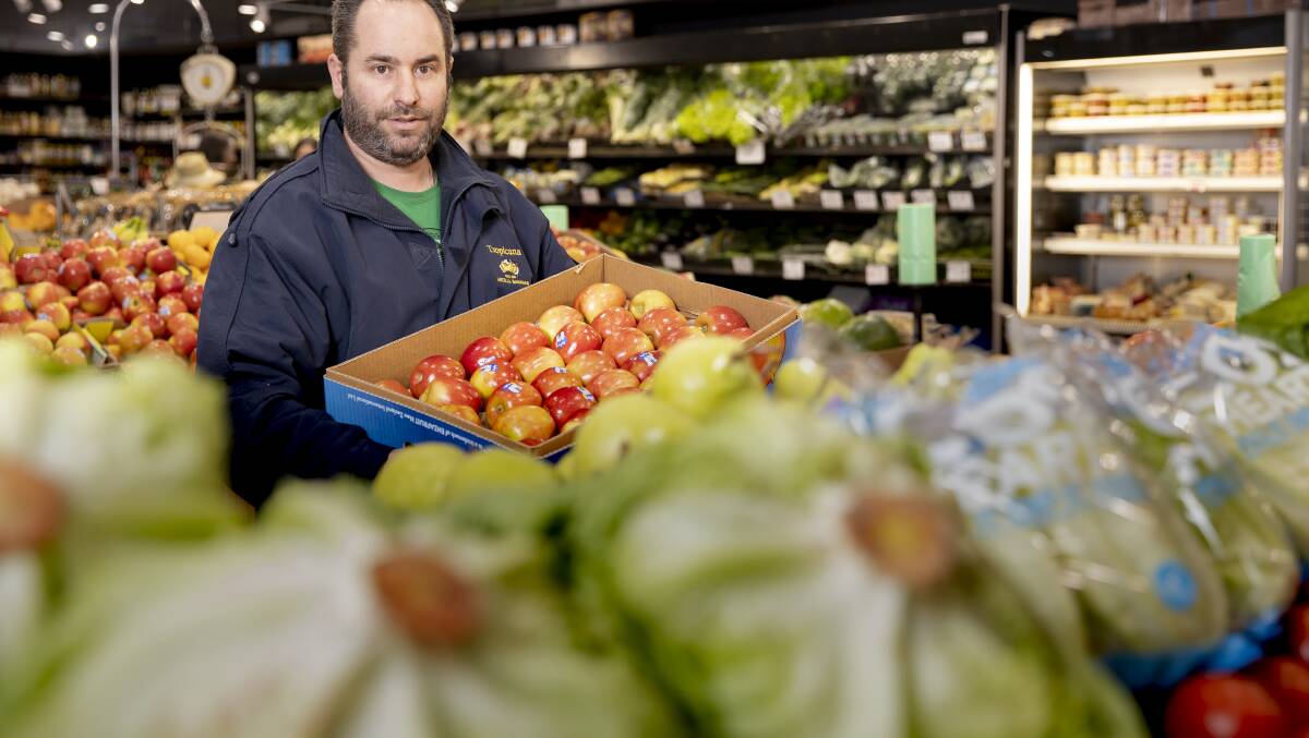 Kostas Stavraki is the owner of Freddy Frapples fruit and vegetables shop in Weston Creek. Photo: Sitthixay Ditthavong