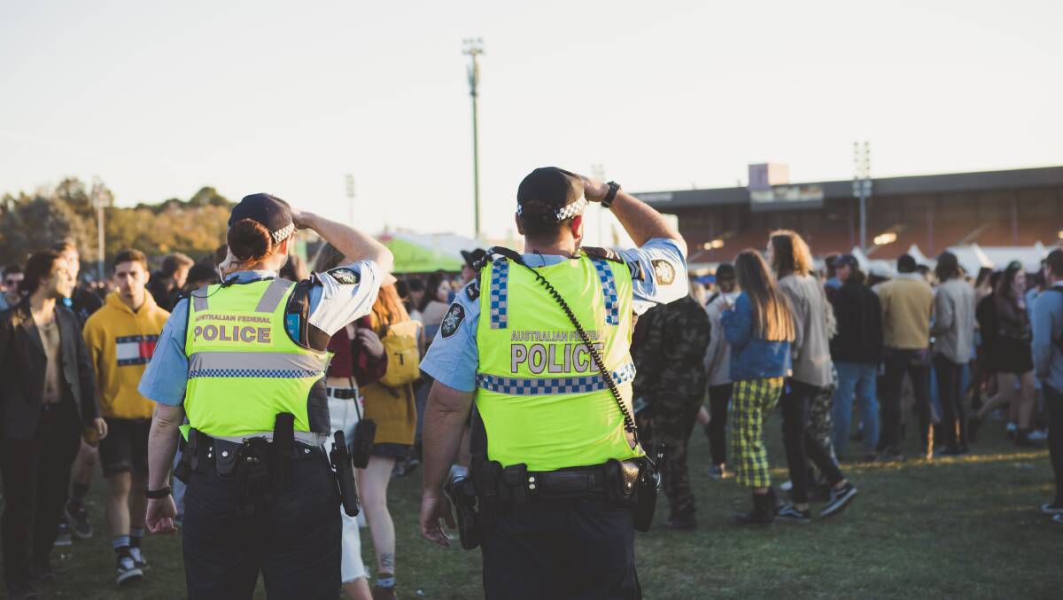 Police officers watch over the crowd at Groovin the Moo 2019. Photo: Jamila Toderas