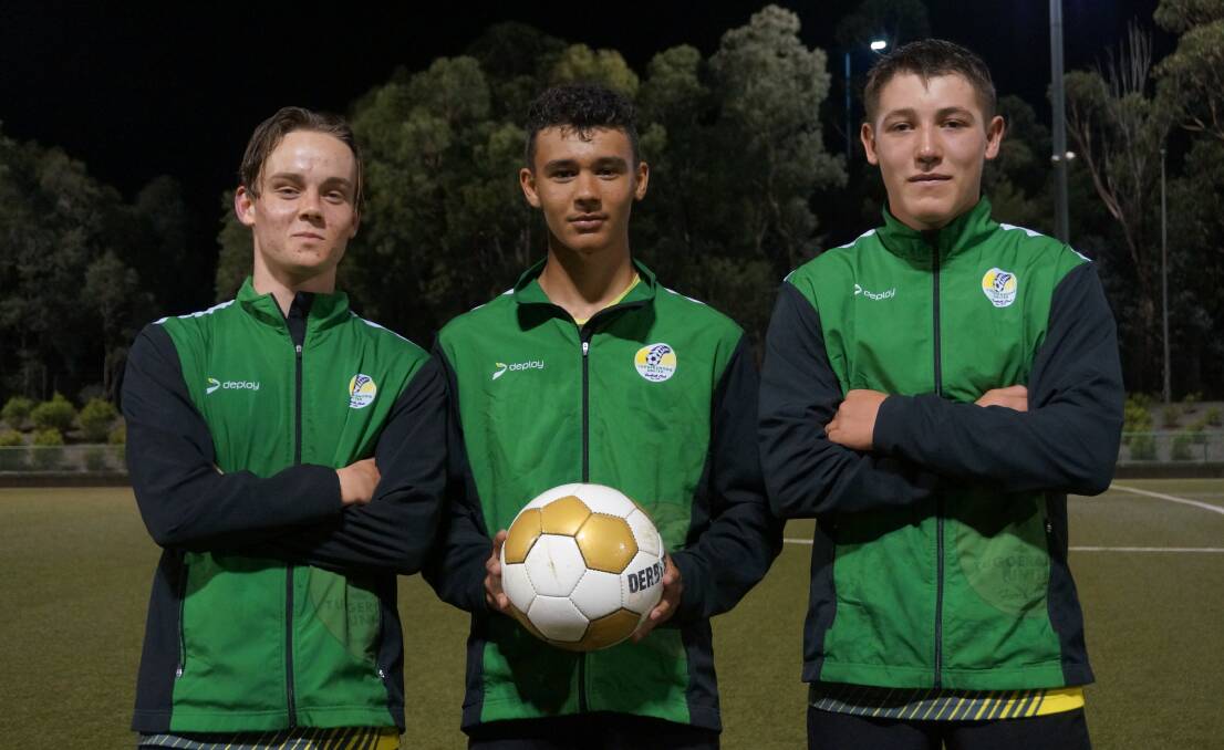 Tuggeranong United youngsters Ben Carling, Daunte Cervo and Harrison Buesnel train with first grade side at AIS Synthetic. Picture: Supplied.