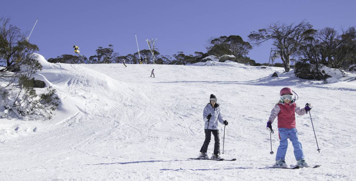 Perisher opens early. Joanne Beattie and daughter Zara were some of the first on the slopes this season on Saturday. Picture: Perisher