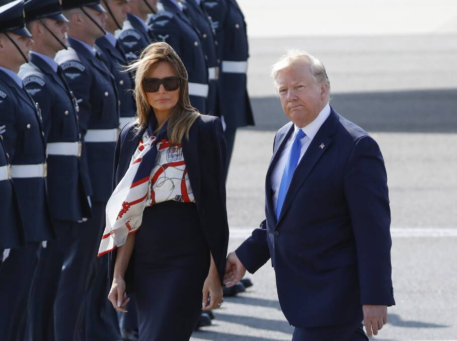 First Lady Melania Trump and U.S. President Donald Trump as they disembark from Air Force One after arriving in London. Picture: Bloomberg