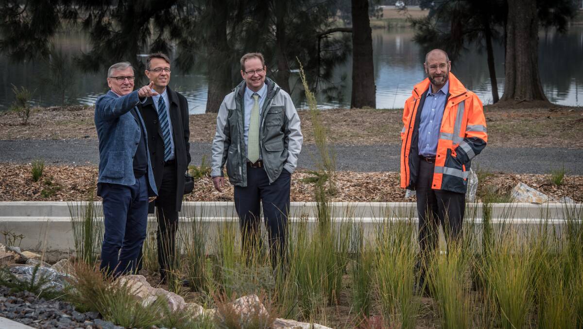 Managers of the ACT Healthy Waterways Project at the Isabella Plains rain garden on Tuesday, from left, Peter Wright, Matt Kendall, Ian Walker and Kevin Earle. Picture: Karleen Minney