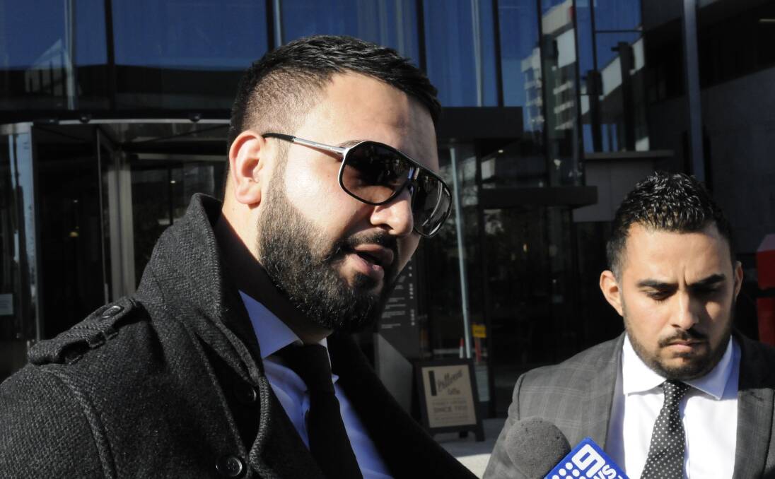 Tamim Nozhat's brother Jamshid Nozhat and solicitor Javid Faiz speak to the media outside court. Picture: Elliot Williams