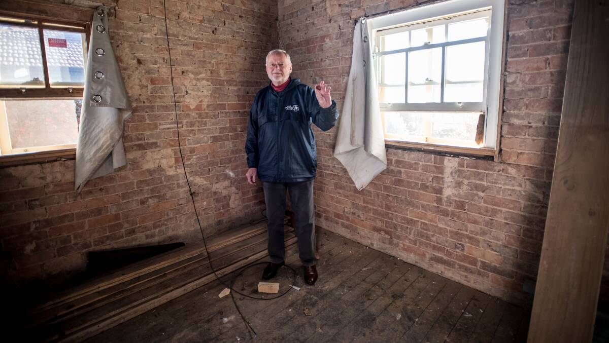 Peter Conway was renovating a house in Braddon and found a WWII soldier's dog tag in the wall belonging to Warrant Officer Andrew McNeill. Picture: Karleen Minney