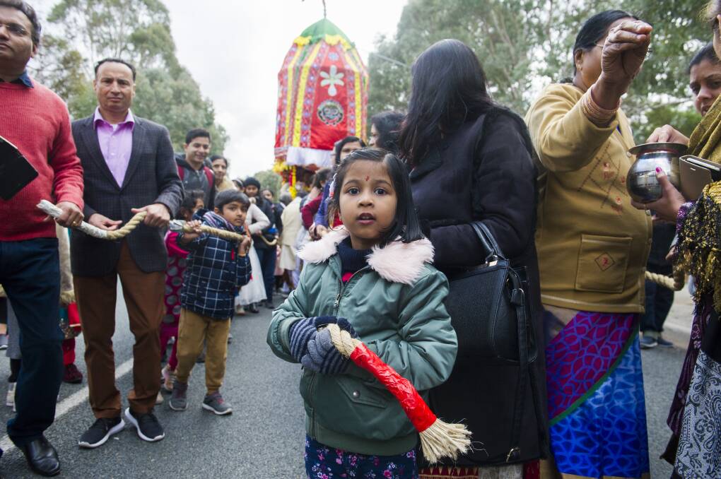 Children help pull the chariot at the Chariot Festival 2019 on Saturday at the Hindu Temple and Cultural Centre. Picture: Dion Georgopoulos