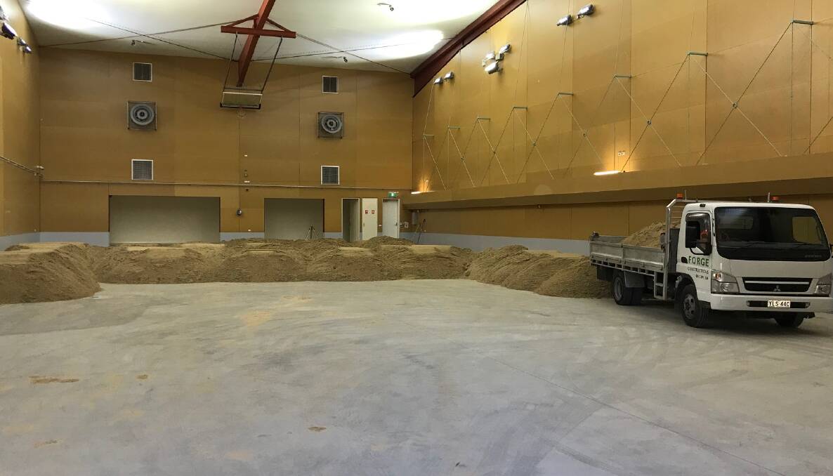 Trucks have delivered 550 metric tonnes of sand to the AIS. Picture: Supplied