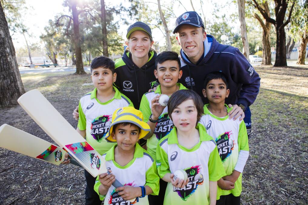 NSW cricketers Saskia Horley and Ryan Hadley are in Canberra to promote junior cricket registrations. Horley and Hadley are pictured here withKunwar Dhillon 9, Vuvraj Dhillon 10, and Thamis Kotni 7. Front, Rohan Dissanayake 6, and Torin O'Mera 7. Picture: Jamila Toderas