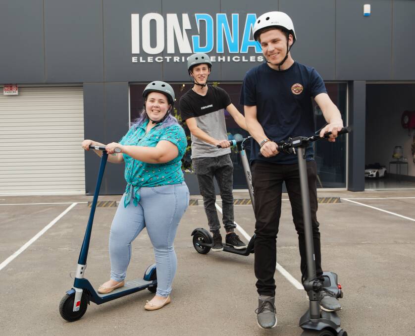 As e-scooters become legal in the ACT on Friday, Taylor Jones, 23, Riley English, 19, and Nick Diggins, 23, were keen to test ride one. Picture: Jamila Toderas.