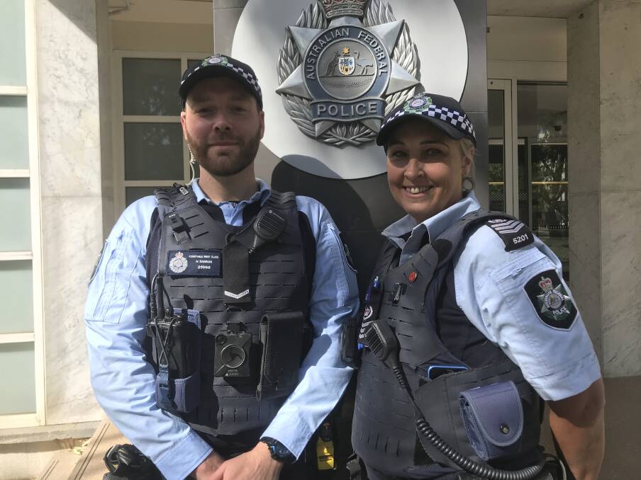ACT Policing First Constable Nicholas Bannan and Detective Sergeant Elizabeth Swain. They have been called to incidents at Christmas that people normally wouldn't escalate. Picture: Cassandra Morgan