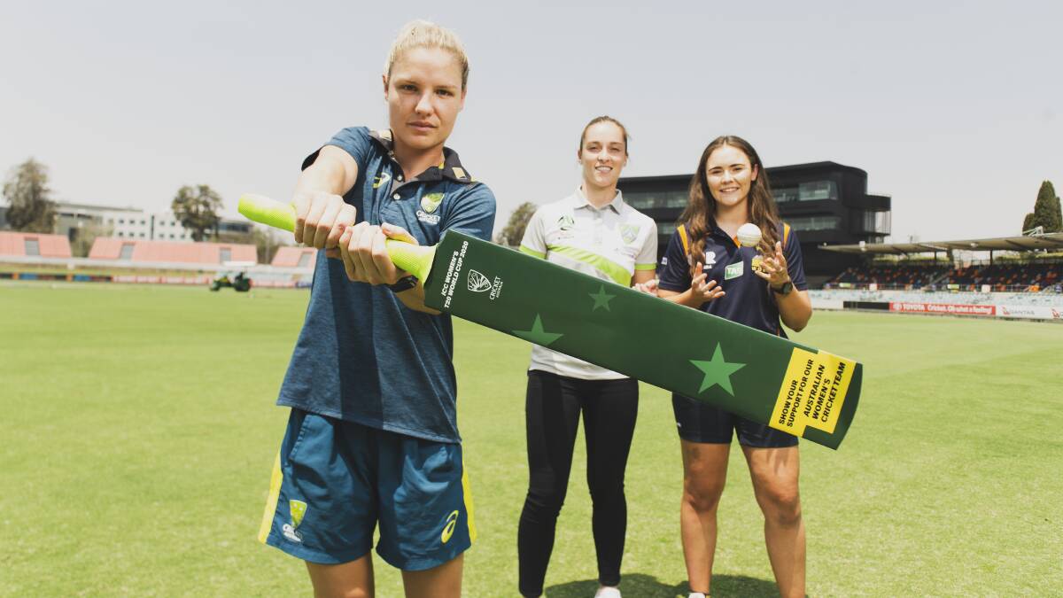 Australian cricketer Nicola Carey, with Canberra United's Nikola Orgill, and Brumbies Super W player Jane Garraway. Picture: Dion Georgopoulos