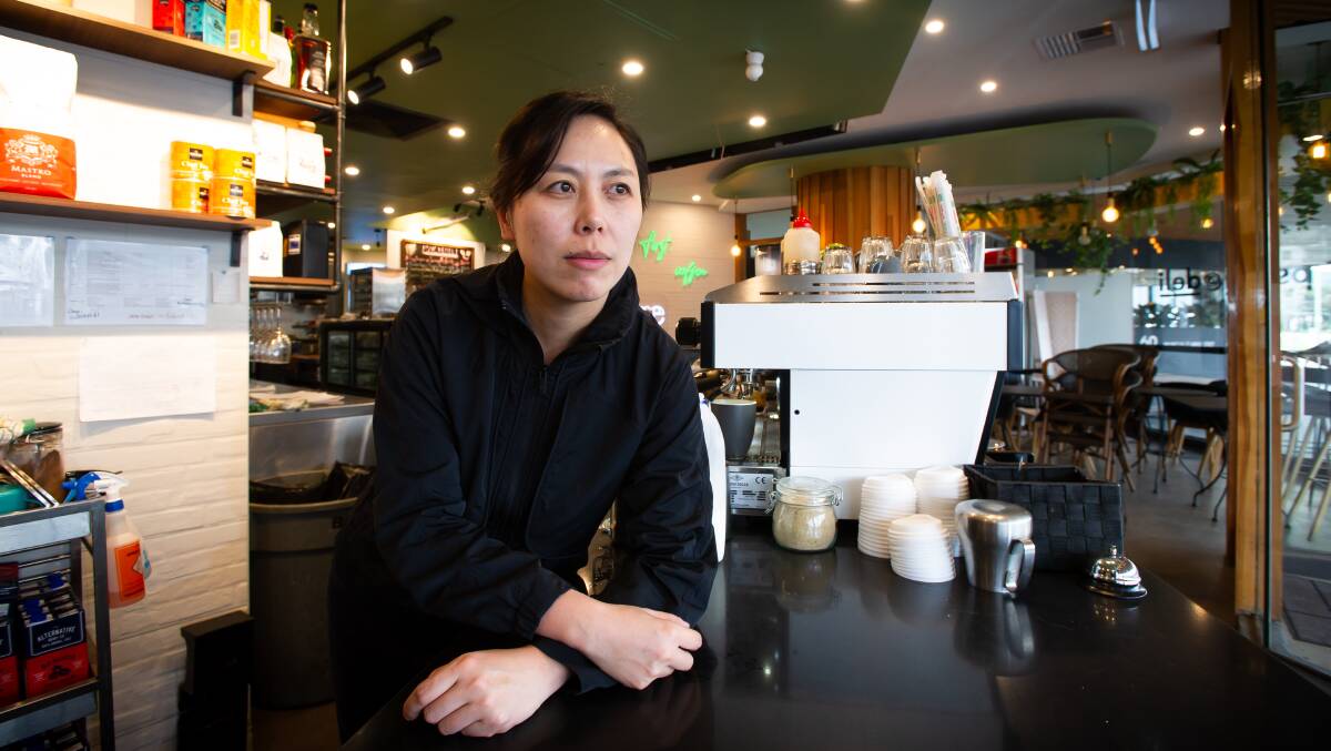 Owner of Psychedeli Cafe, Kelly Wang, says cafes are quieter on Mondays and Fridays as people choose to work from home. Picture by Elesa Kurtz
