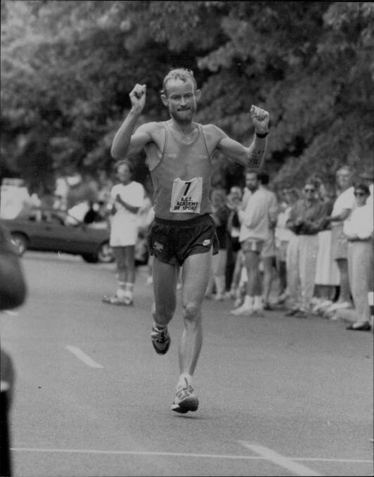 Geoff Moore crossing the line in fifth position in the Canberra Marathon in April, 1990.
Picture: Kate Callas
