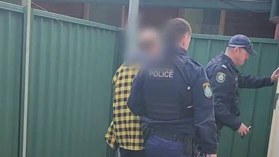 Police take a man into custody in relation to the theft of more than $1 million in silver.