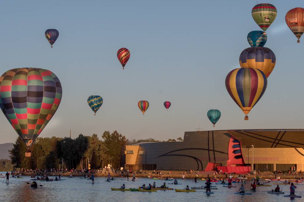 Don't be afraid to get plenty of balloons and some Canberra landmarks in photos. Picture by Karleen Minney