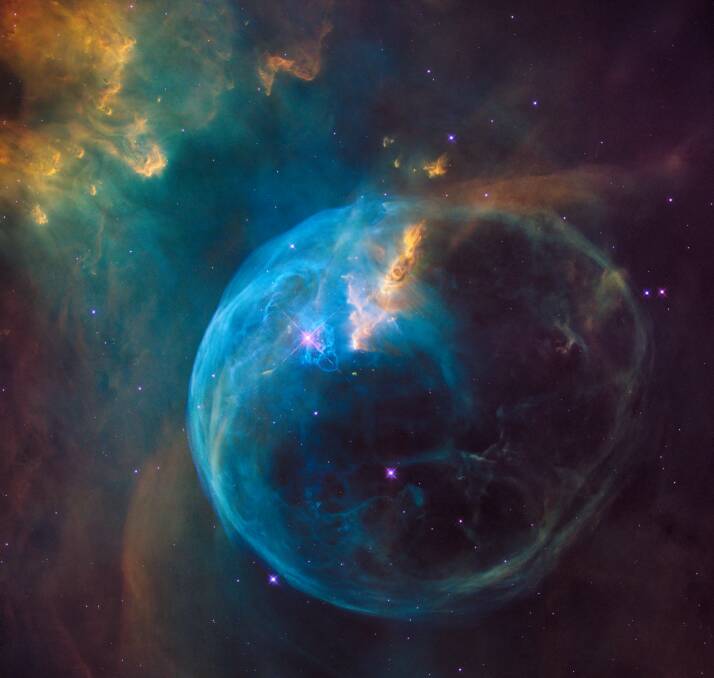The Bubble Nebula, also known as NGC 7653, captured by the Hubble Telescope. It is an off-centred star whose mass is more than ten times that of our sun. Picture NASA/Unsplash