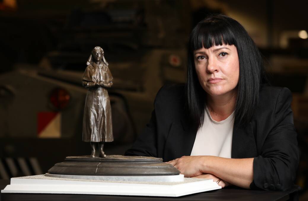 Australian War Memorial head of art Laura Webster with a maquette of Vivian Bullwinkel. Picture by James Croucher