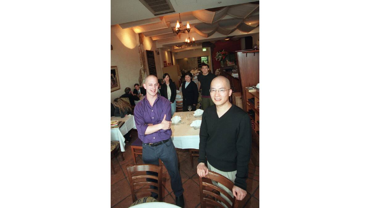 Chris Hansen, left, and Josiah Li with some of the staff at The Chairman and Yip. Picture by Martin Jones