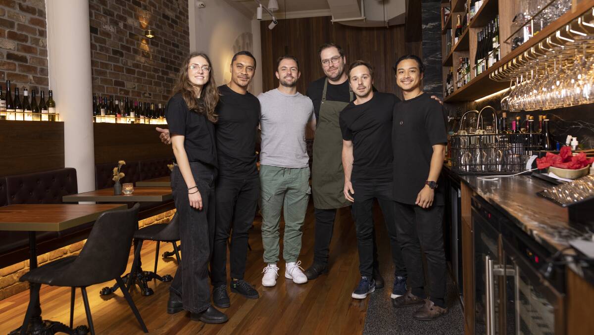 Wine Room venue manager Phoebe Andrews, co-owner Mars Heleta, co-owner William Fisher, group executive chef Josh Smith-Thirkell, owner Paolo Sossi and venue manager Dominic Soriano. Picture by Keegan Carroll