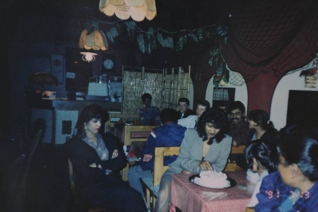 Rama's Fijian Indian restaurant at the Pearce shops, with owner Mini Gaundar (centre with coat), in July 1991. Picture supplied