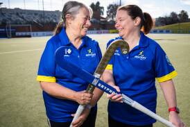 Jan Hamilton, left, with daughter Lyn Watson before the masters hockey tournament. Picture by Eleza Kurtz