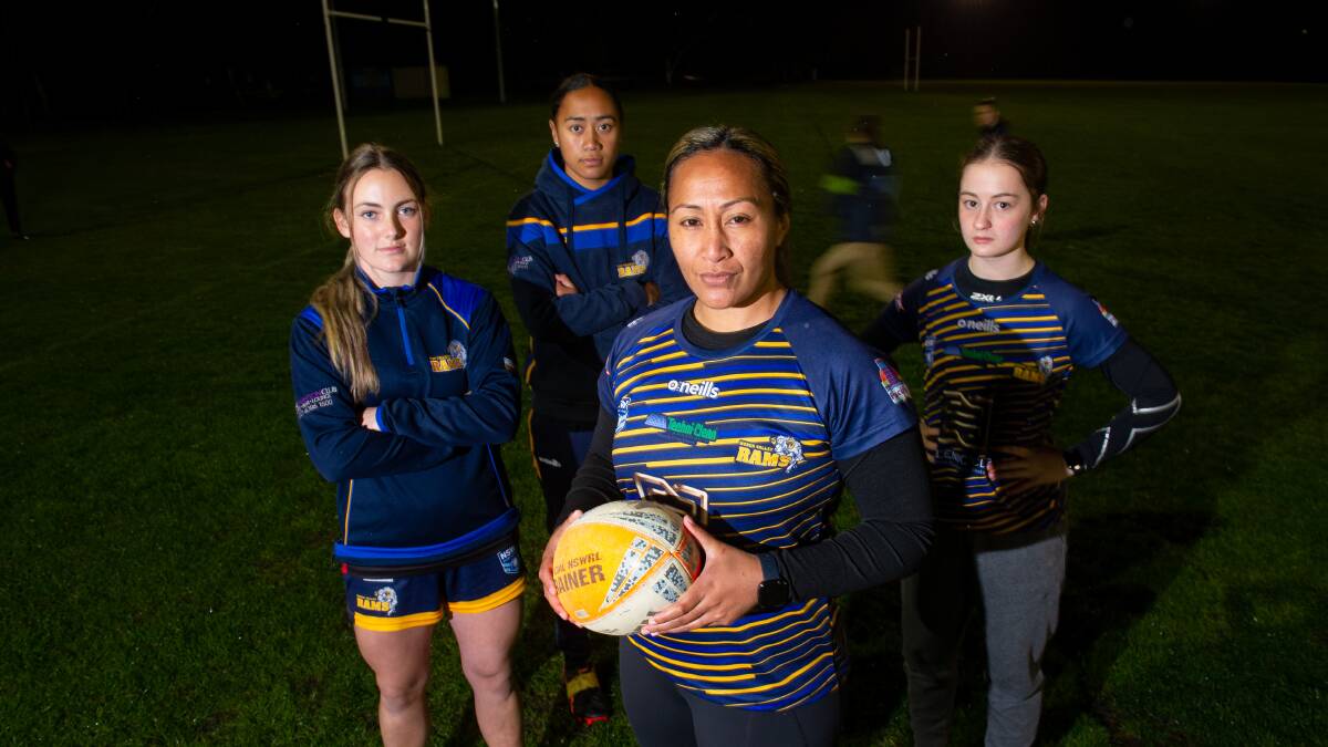 Woden Valley Rams captain Irene McArthury with some of the team's stars at training this week. Picture by Elesa Kurtz