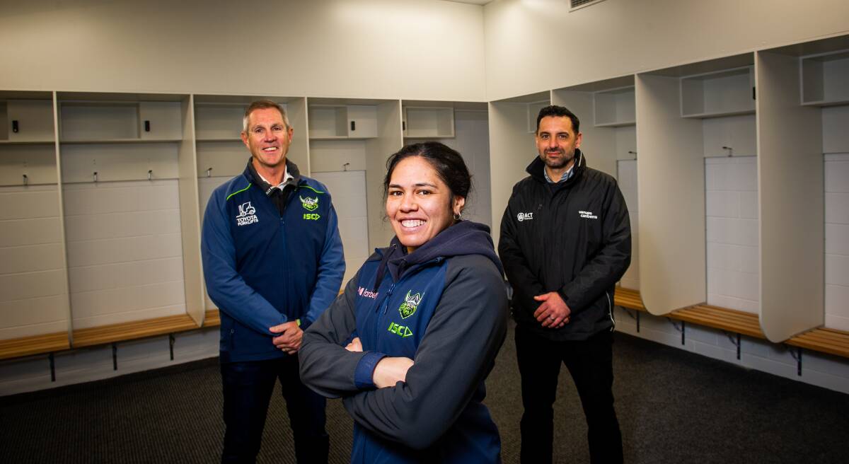 Cheyelle Robins-Reti, centre, with Raiders boss Ron Furner and Venues Canberra's Jared Rando at the new change room facilities. Picture by Elesa Kurtz