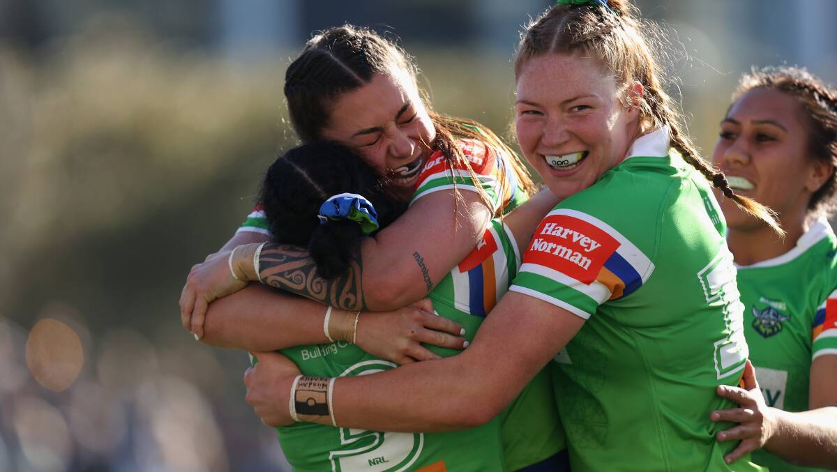 Madison Bartlett, centre, scored the first try in Raiders NRLW history. Picture Getty Images