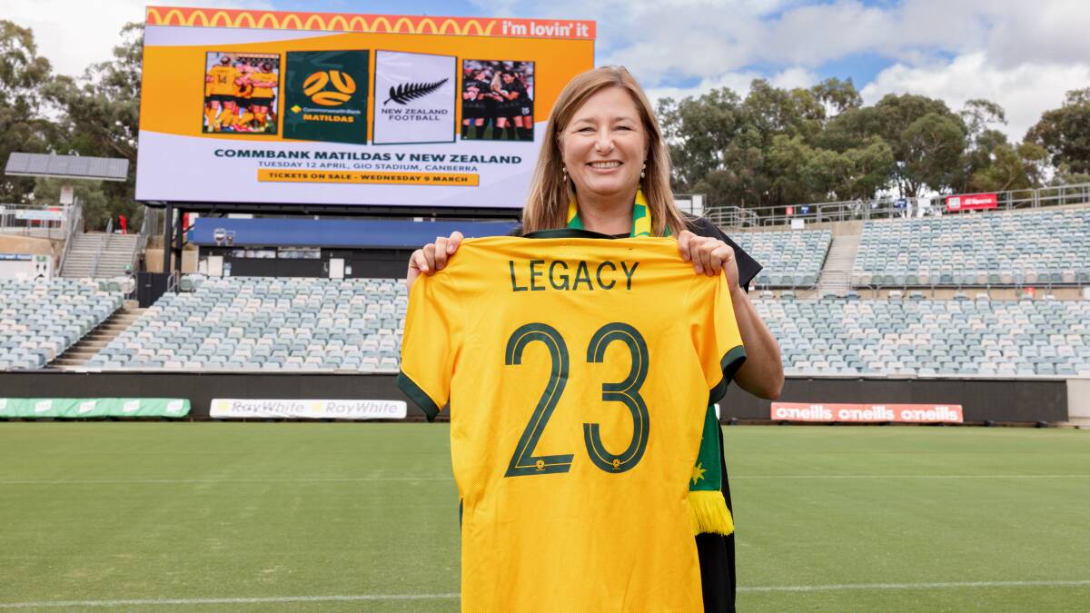 ACT Sport Minister Yvette Berry with a Matildas World Cup legacy jersey. Picture by Sitthixay Ditthavong