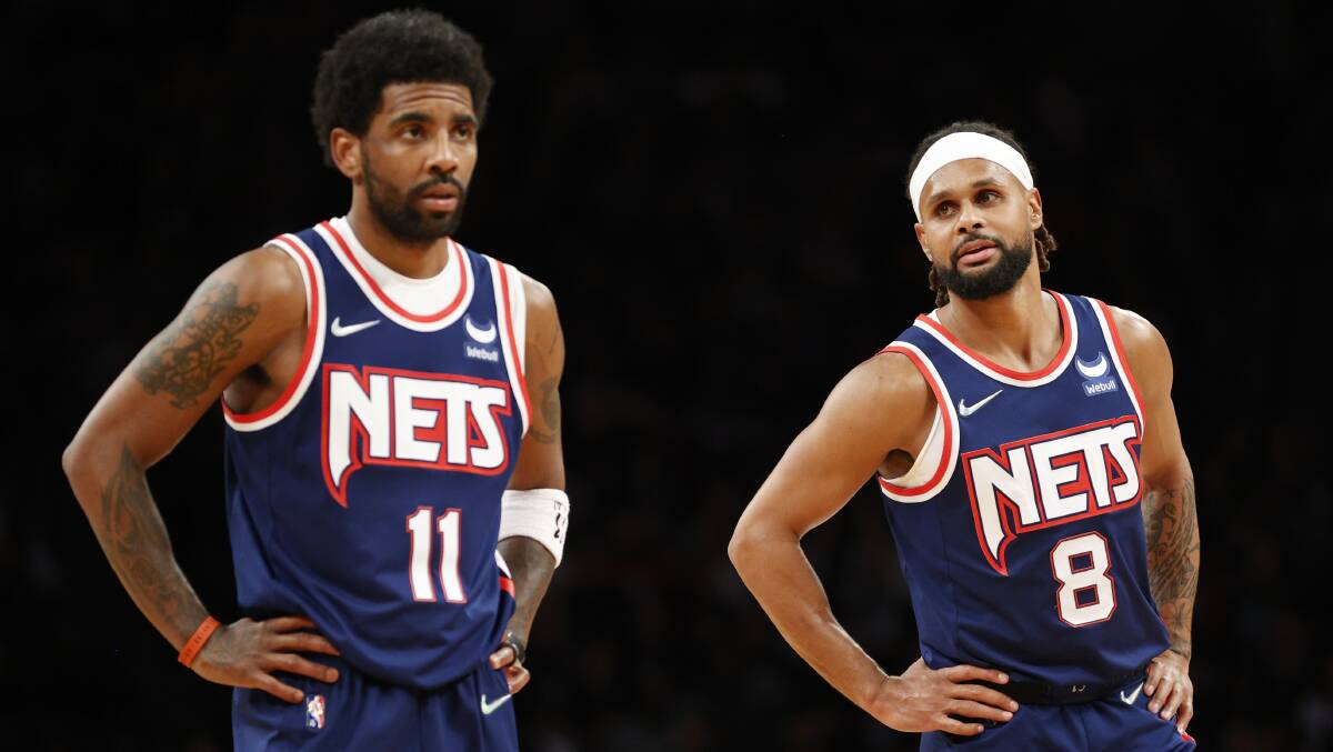 Patty Mills, right, hopes Kyrie Irving and his Nets teammates can gel together to chase a title this year. Picture Getty Images
