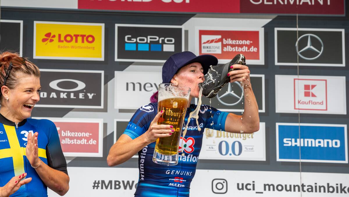 Rebecca Henderson does a "shoey" after winning the mountain bike World Cup event in Albstadt. Picture Getty Images
