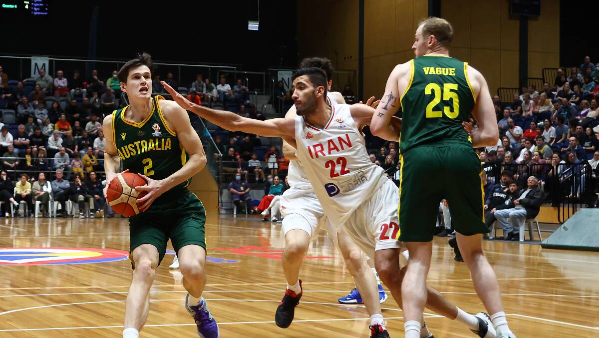 Alex Toohey, left, made his Australian Boomers debut as a 17-year-old. Picture Getty Images